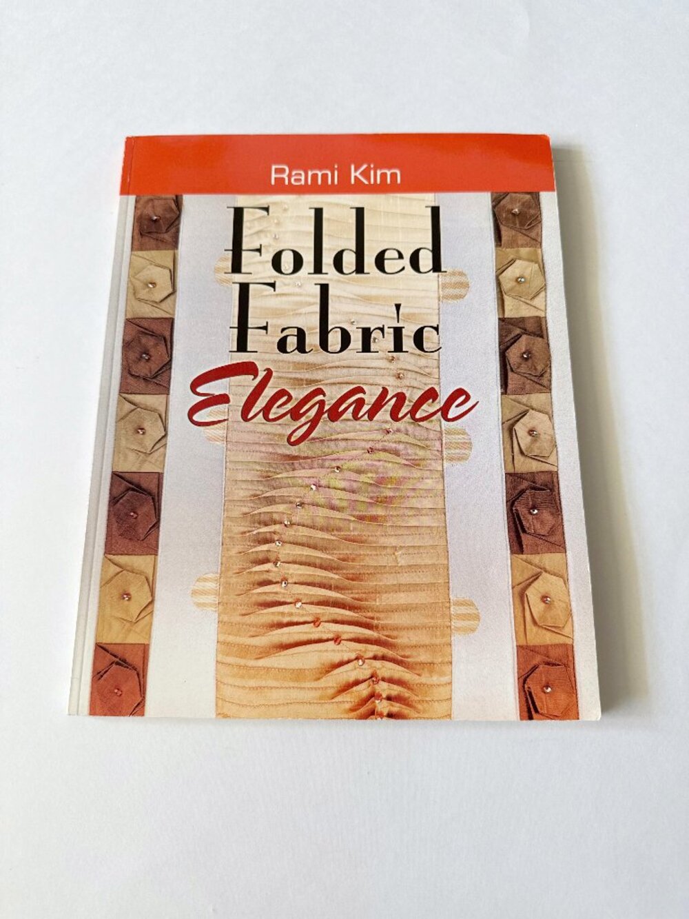 Folded Fabric Elegance by Rumi Kim Korean folding techniques